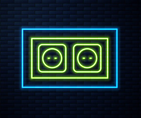 Glowing neon line Electrical outlet icon isolated on brick wall background. Power socket. Rosette symbol. Vector.