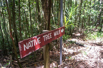 Red Signboard in Colo-i-Suva rain forest national park, nature reserve near Suva, Viti Levu island, Fiji, Melanesia, Oceania.