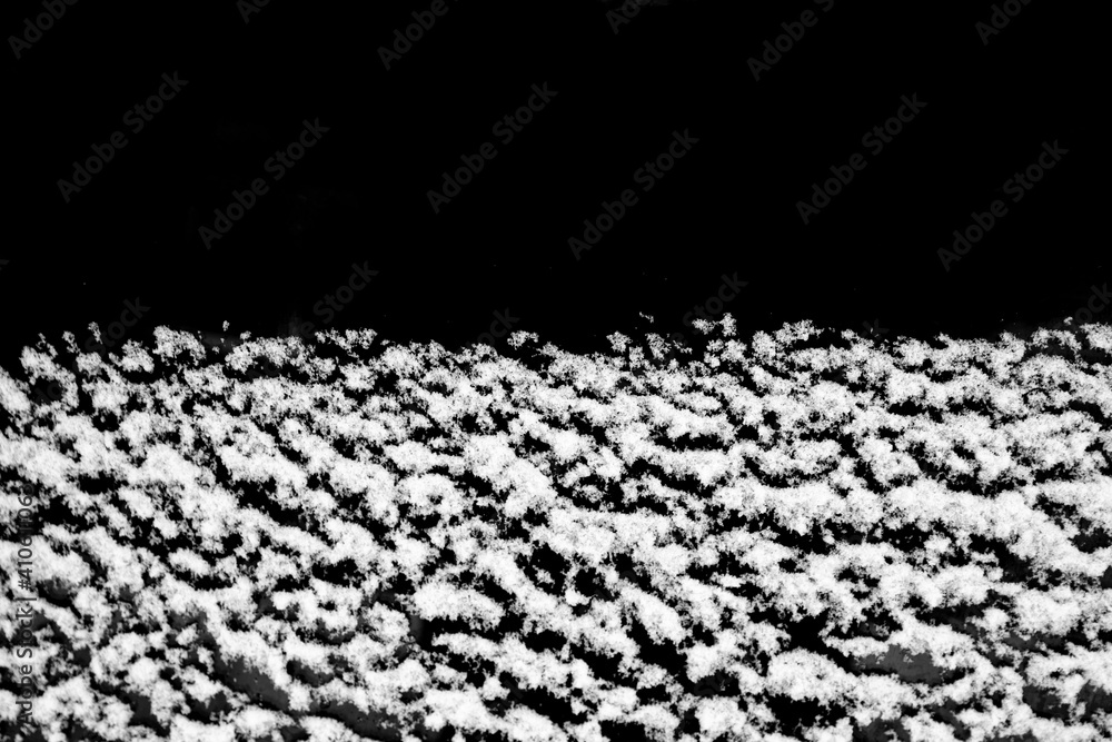 Poster white snow isolated on a black background. winter elements for design