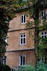 Fototapeta na wymiar Old building framed with foliage, Zagreb, Croatia