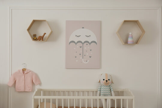 Modern baby room interior with crib and toys