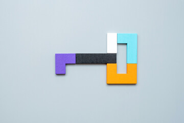 Key shape of geometric colorful wood puzzle pieces. logical thinking, business logic, Conundrum,...