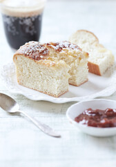 Simple yeast cake on bright background. Close up.	