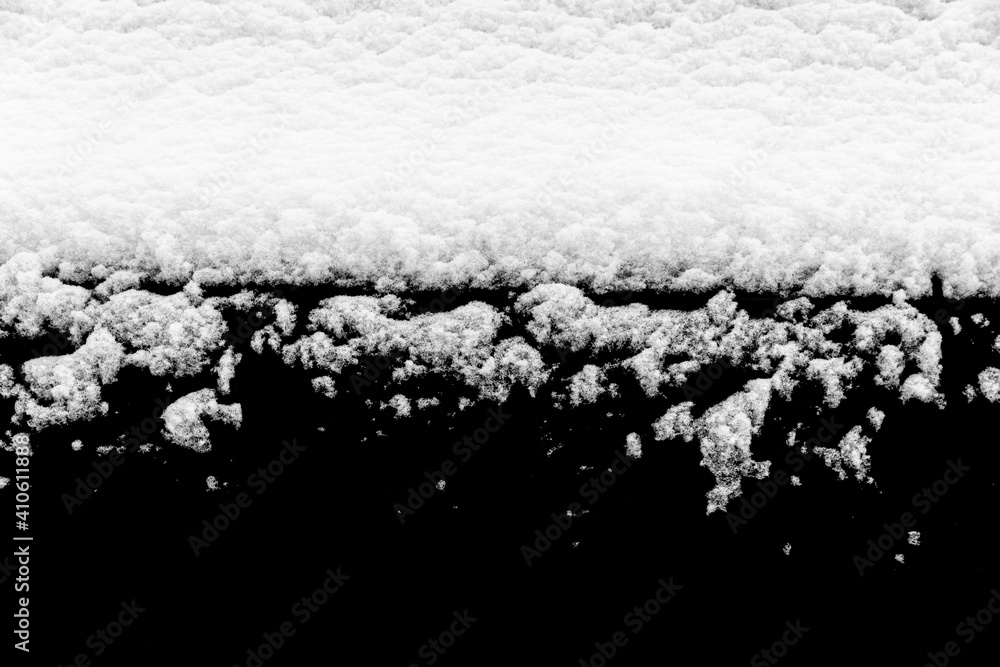 Poster white snow isolated on a black background. winter elements for design