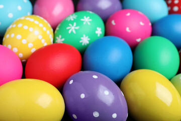 Fototapeta na wymiar Colorful eggs as background, closeup. Happy Easter