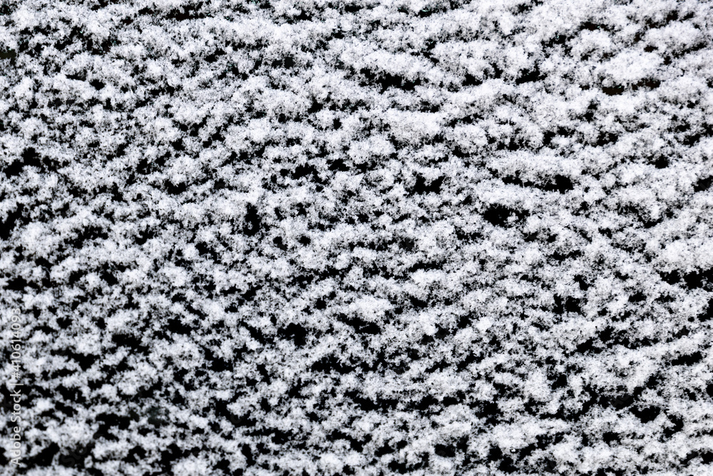 Poster white snow isolated on a black background. winter elements for design