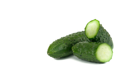 Cucumber and slices isolated over white background