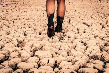 The  sad man on the crack land drought and crisis of water.