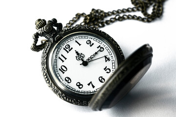 Vintage pocket watch isolated on white background