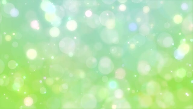 Glittering green particles. 4K background material for loop playback