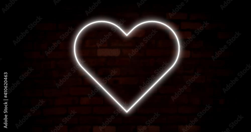 Poster Animation of white neon heart flashing on dark brick wall background