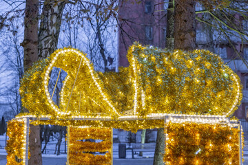 Festive light installation for Christmas and New Years on the central city square. Zelenogradsk, Russia