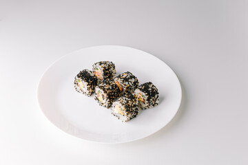 Japanese food: maki and nigiri sushi set. Sushi rolls (Philadelphia) with rice, fish salmon, smoked...