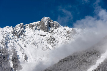 Fototapeta na wymiar Alps Snow mountain view from Chamonix Mont Blanc, France in Winter.