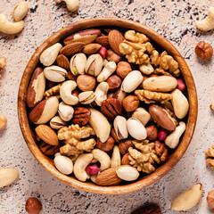 Various Nuts in wooden bowl