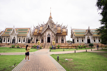 Naklejka premium Nakhon Pathom, Thailand-November 1, 2020 : Asian tourists at Wat Si Sa Thong, Amazing old Historical Sites in Thailand.