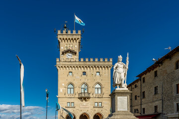 The Palazzo Pubblico and the statue of liberty in the historic center of San Marino on a sunny day