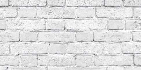 White shabby brick wall close-up wide texture. Light grey rough old brickwork widescreen background