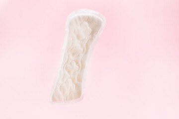 sanitary napkin or sanitary pad for intimate hygiene on a pink background