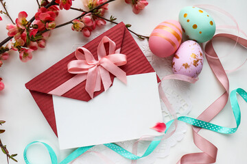 Easter card mockup. Easter eggs, spring flowers  and willow twigs 