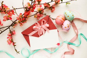 Easter card mockup. Easter eggs, spring flowers  and willow twigs 