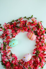 Easter card mockup. Easter eggs, spring flowers  and willow twigs 