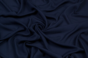 Fabric satin silk drapery. blue textile	