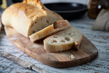 White sliced bread on a wooden table