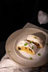 Close up of apple austrian strudel with cinnamon on a plate