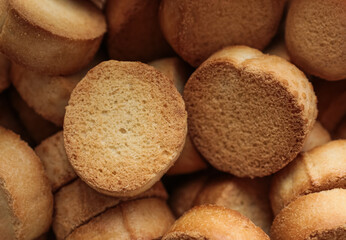 Fototapeta na wymiar background of several pieces of small brown cookies