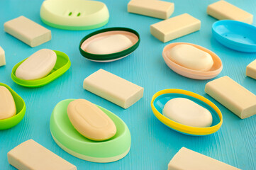 There is a lot of solid soap in soap dishes. Solid soap for hygiene and cleanliness. Close-up soap.