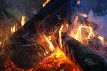 Close up shot of burning firewood in the fireplace