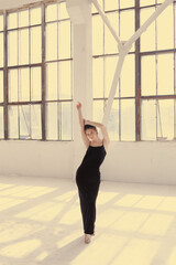 Fototapeta premium Fashion beauty portraits of a girl in a black dress and with vitiligo