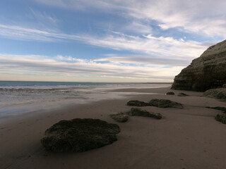 Rocks of the Atlantic coast at sunset near the Argentine town of Las Grutas