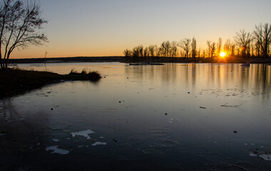 Sunset on a beautiful lake in winter
