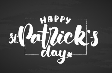 Vector Hand drawn lettering of Happy St. Patrick's Day on blackboard background.