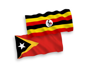 Flags of East Timor and Uganda on a white background
