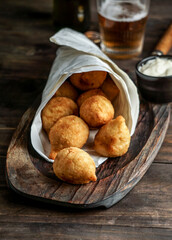 coxinha - popular food in Brazil consisting of chopped or shredded chicken meat covered in dough