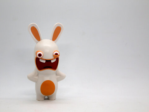 Crazy rabbit. Cartoon and Videogame. Mysterious race of rabbit like creatures that have come from another planet. Toy. Isolated white 