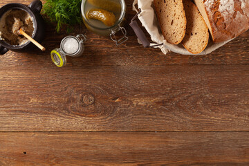 Sandwich with lard and pickled cucumber. Traditionally rendered lard with cracklings and onion.