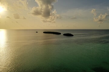 Fototapeta na wymiar Closer View of Island in the Ocean at Sunset