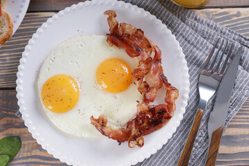 Breakfast with fried eggs and bacon