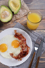 Breakfast with fried eggs and bacon