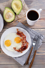 Breakfast with fried eggs and bacon