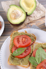 Breakfast with sandwiches with guacamole sauce
