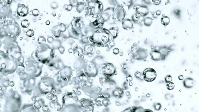 Super Slow Motion Shot of Moving Bubbles on White Background at 1000fps