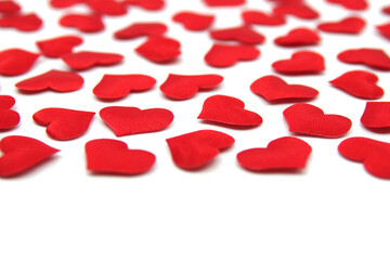Valentines day background. Red bright hearts isolated on white background. Valentines day concept. Valentines card with red hearts. Valentines pattern. Copy space for your text.