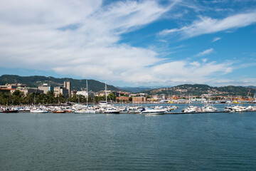Fototapeta na wymiar La Spezia port, Liguria, Italy. View on the sea and and mountain. yacht and boats in the port.