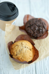 Chocolate and vanilla muffins in paper wrapper