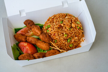 Cardboard boxes with hot rice to go. Food delivery